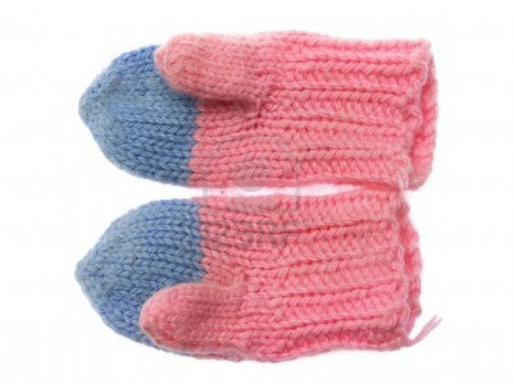 couple-of-pink-blue-wool-mittens-on-white-background