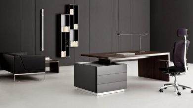 exotic black marble office desk applied on the white modern ceramics floor it also has small black seat that can add the beauty of the house design ideas 9 Black Office Desk Designs & How to Choose the Best one - 4