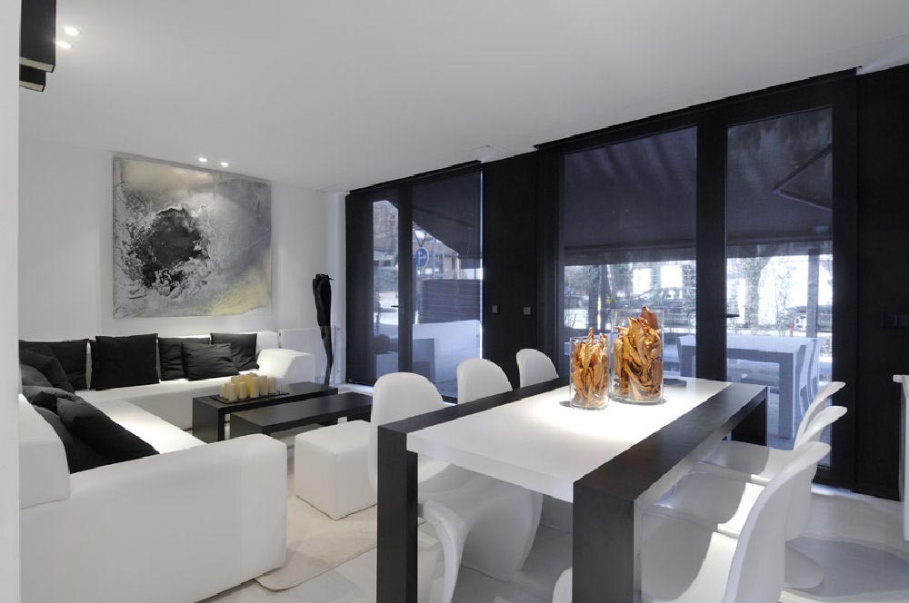 Modular-House-in-Madrid-Spain-interior-design-dining-and-living-room 25 Elegant Black And White Dining Room Designs