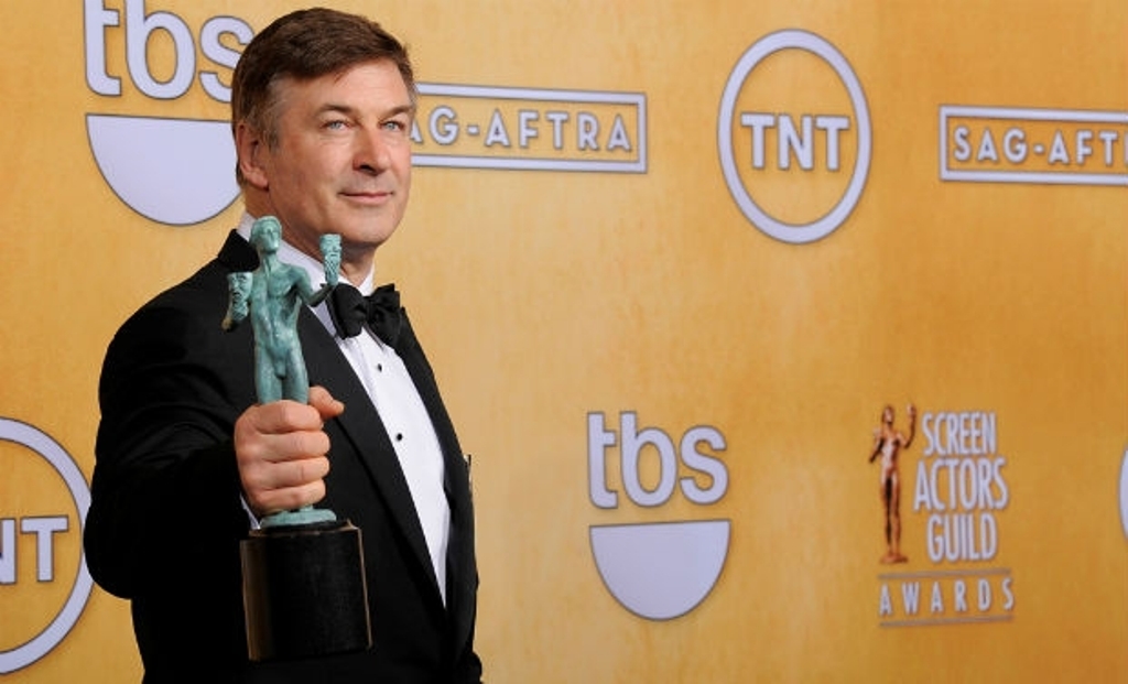 Alec Baldwin poses backstage with the award for outstanding male actor in a comedy series for '30 Rock' at the 19th Annual Screen Actors Guild Awards
