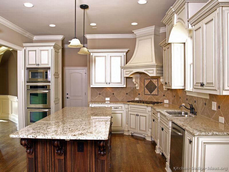 kitchen-cabinets-traditional-two-tone-antique-white-wood-hood-island-luxury Stunning And Contemporary Victorian Decorating Ideas