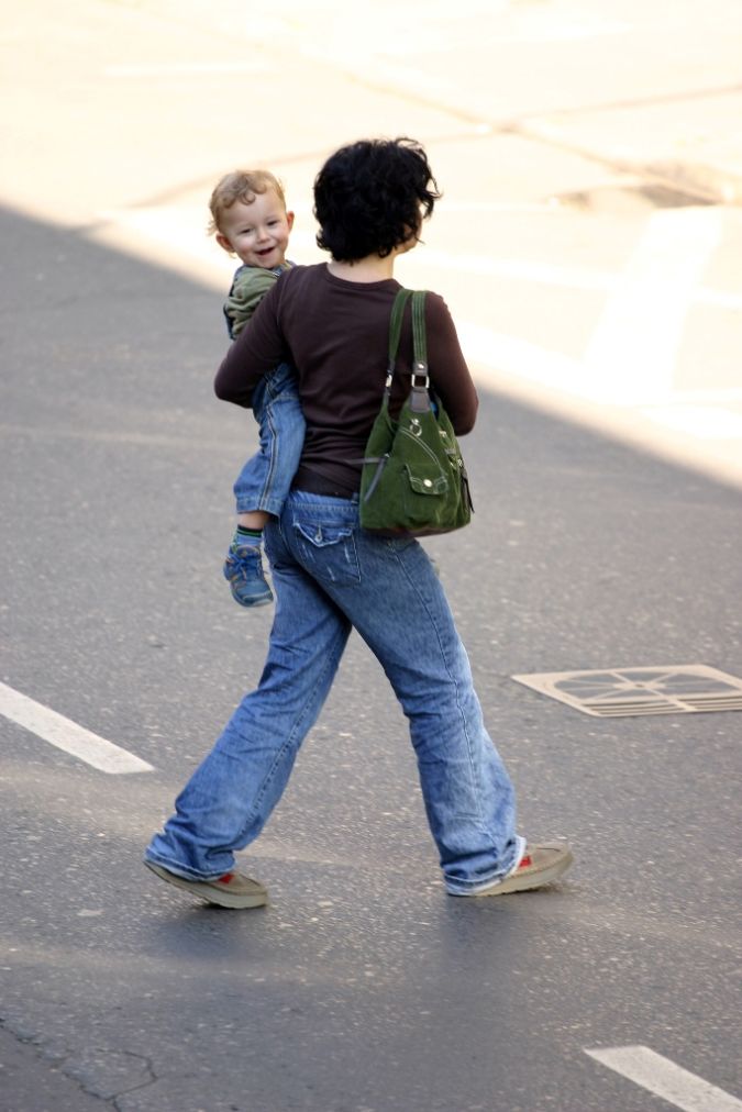 mother-carrying-child Do You Know How to Deal with Tantrums?