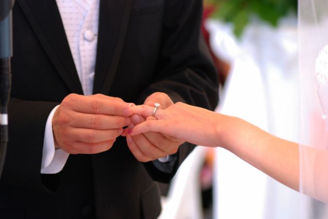 How to Save Your Marriage and Prevent Divorce 15 He puts the wedding ring on her