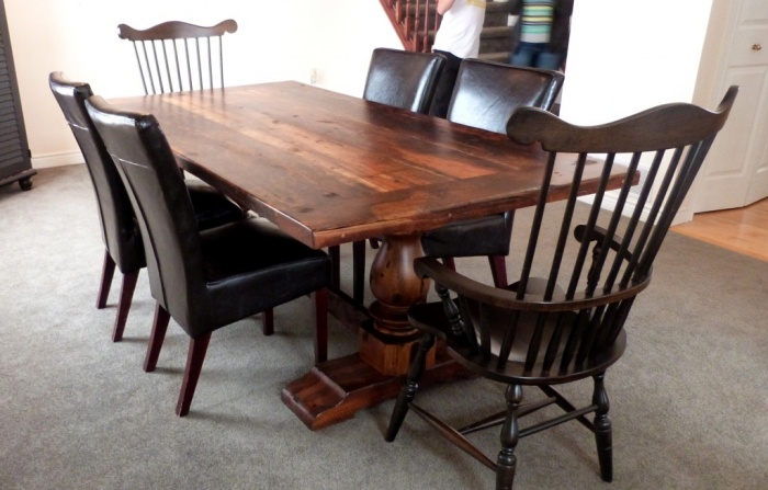 Reclaimed-threshing-floor-Pedestal-trestle-table-with-comb-back-arm-chairs What Are the Latest Home Decor Trends?