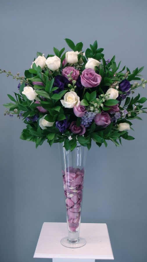 Tall-purples-with-ivory-rose-petals-in-vase