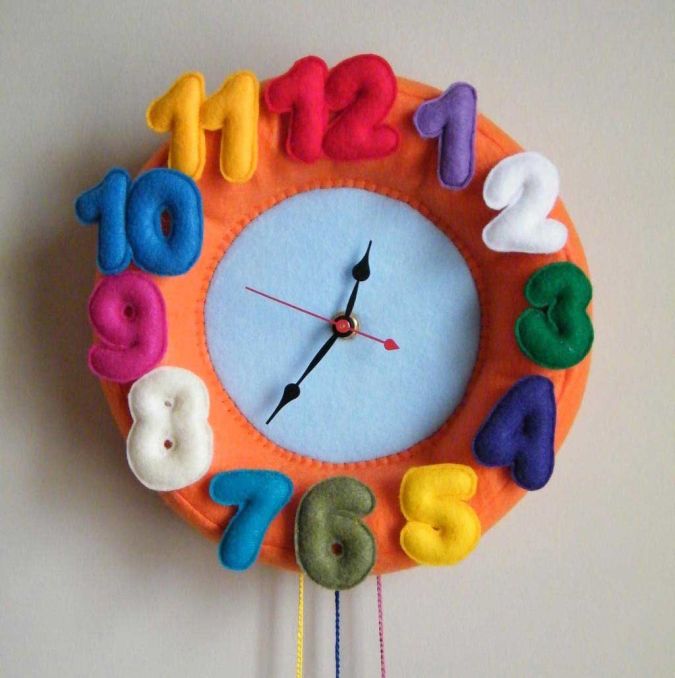 15 Amazing Wall Clocks Will Be Pieces Of Art In Your Home 27 colorful-felt-cool-wall-clock-kids