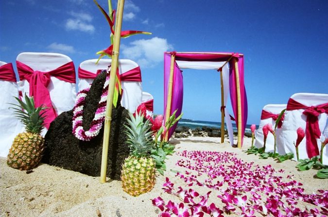 malia-wedding-setup-in-hawaii-on-the-beach-with-purple-lavender-orchids-pineaplles-and-lava-rocks-pacific-beach-wedding-theme Wedding Planning Ideas