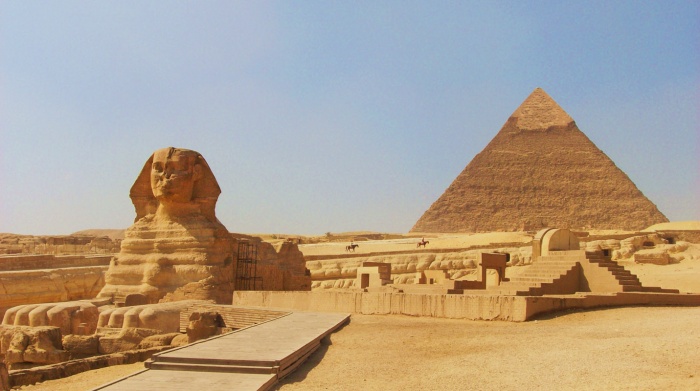 the-sphinx-at-gizacairo-in-egypt-with-the-pyramid-of-chephren-khafre-in-the-background Egyptian Pyramids Architecture