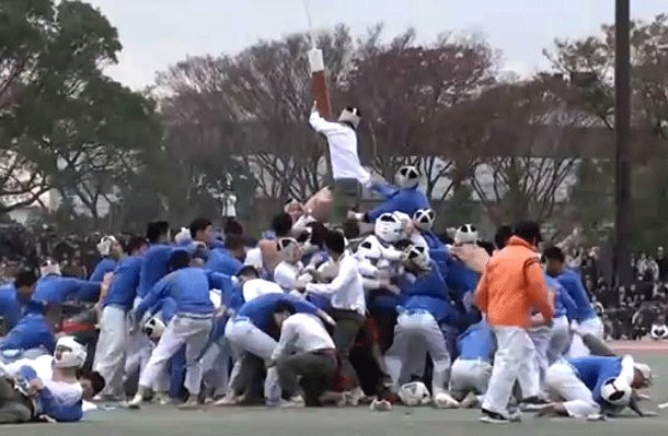 Bo-taoshi ( consists of two teams, each team includes 150 people divided into 75 attackers and 75 defenders and the goal is to knock down the other team's pole)