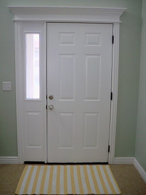 front door with rug