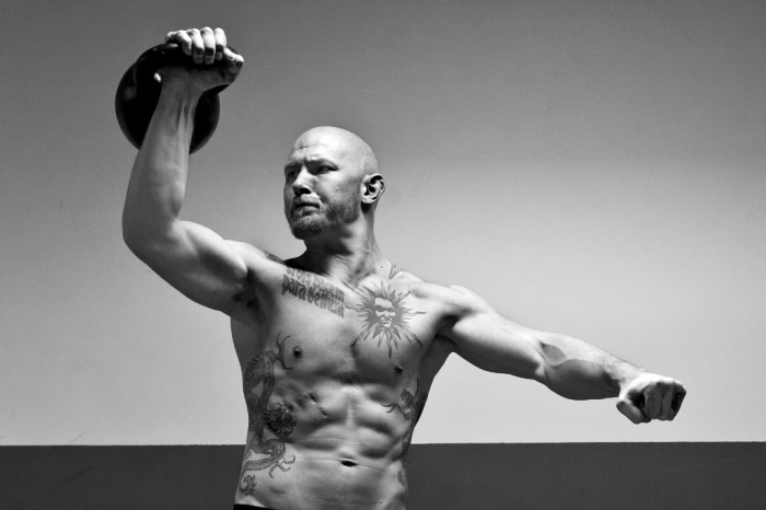 10 MMA Workouts to Achieve Fitness 34 tommy blom kettlebell press