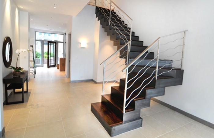 custom-built-staircase-modern-design-metal-railing-downtown-chicago Decorate Your Staircase Using These Amazing Railings