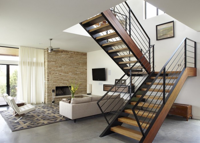 Decorate Your Staircase Using These Amazing Railings 30 wooden-staircase-design-with-railings-made---of-iron-black-colored
