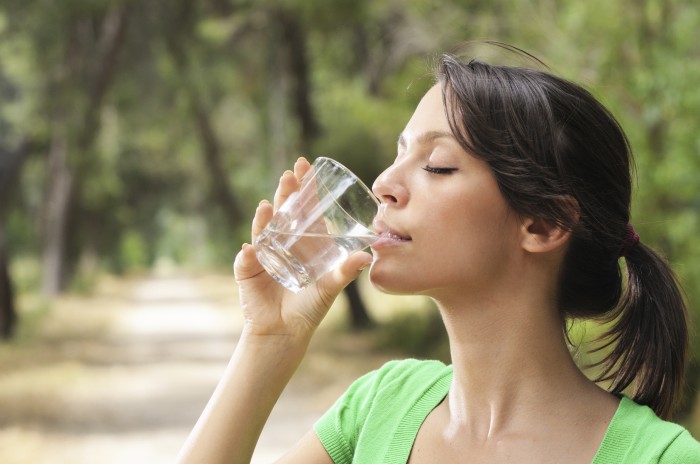 WomanDrinkingWater 10 Advantages Of Drinking Water Which Will Help You To Live A Healthy Life