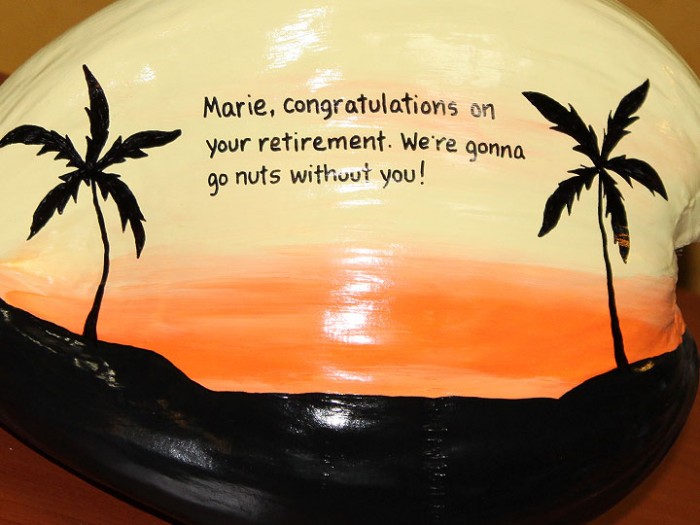 Painted coconut with retirement message