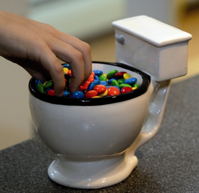 Toilet shaped container that can be used for candies or as a mug for drinks