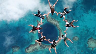 Weird Blue Holes That Are Magnets for Divers Around the World 13 Fly In The Great Blue Hole Belize picture Weird Blue Holes That Are Magnets for Divers Around the World - 8