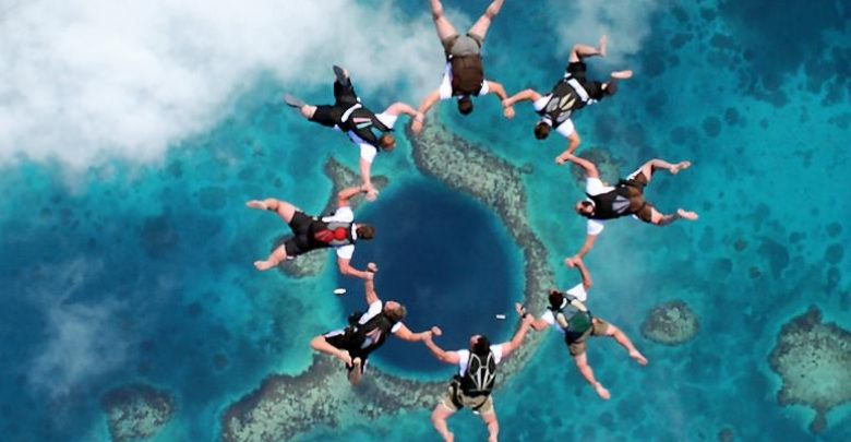 Fly In The Great Blue Hole Belize picture Weird Blue Holes That Are Magnets for Divers Around the World - Belize 1