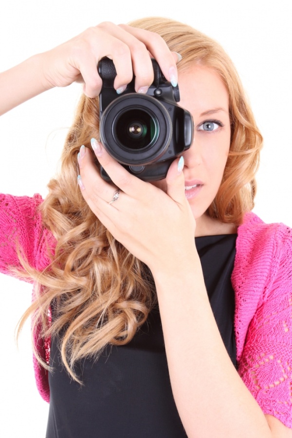 Woman-with-digital-camera- Easy to Follow Tricks & Secrets for Taking Better Digital Photographs
