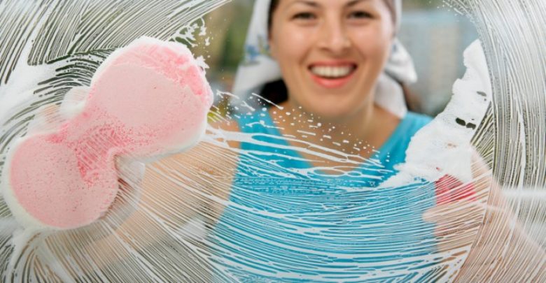 iStock 4239373 washing glass11 6 Tips For Cleaning Glass Without Leaving Any Streaks - use a squeegee 1