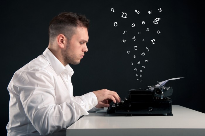 man-using-typewriter
