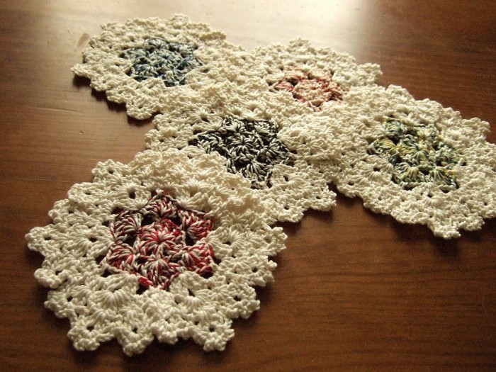 Crochet coasters n different shapes and colors