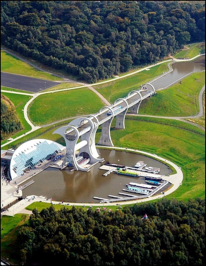 Falkirk Wheel which is situated in Falkirk, Scotland. It is the world's only rotating boat elevator and it was opened in 2002. 