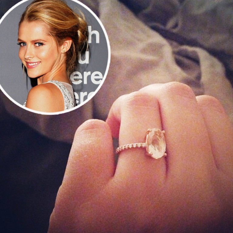 Teresa Palmer with her rose quartz and diamond engagement ring from actor Mark Webber.