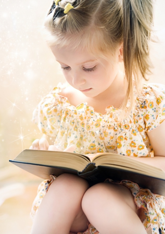 girl-reading-book-eyes-down Do You Know How to Train Your Child to Use the Five Senses?