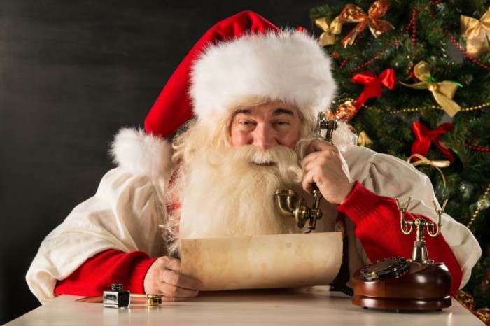 happy-Santa-Claus-calling-phone