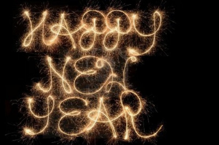 happy-new-year-written-with-sparklers-in-the-sky Awesome & Breathtaking Ideas for New Year's Holiday Decorations