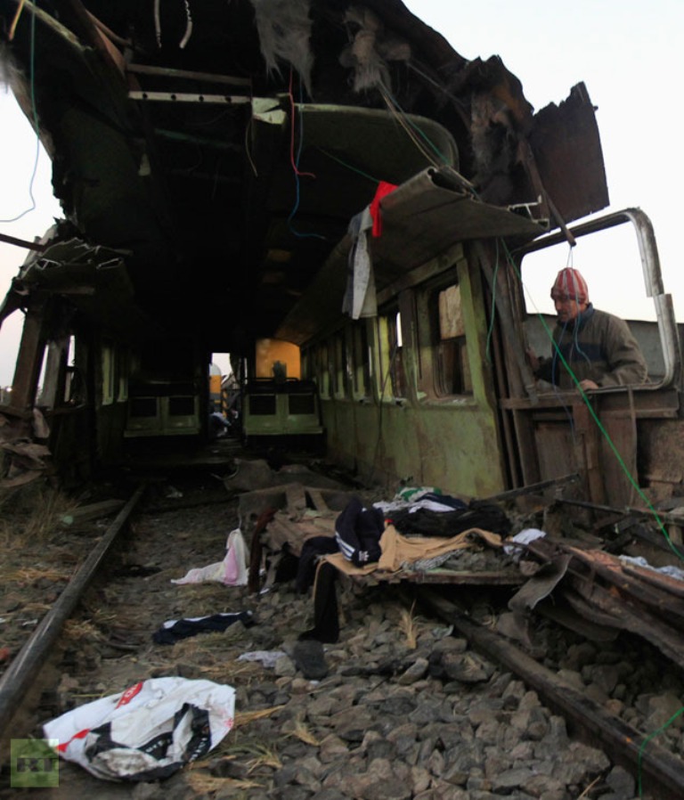 inspects-wreckage-train-crash What Are the Most Serious & Catastrophic Train Accidents in 2013?