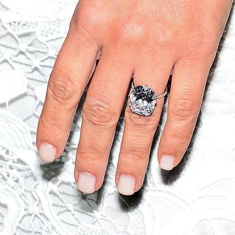kim-kardashian-engagement-ring-nails-cuticles-w724 35+ Fascinating & Stunning Celebrities Engagement Rings for 2020