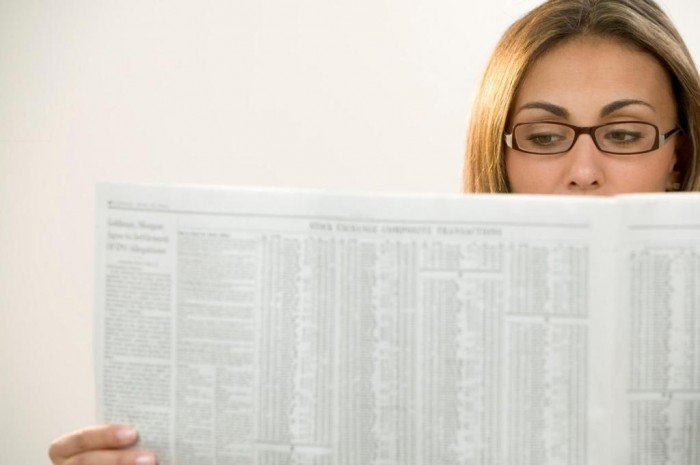 15 Tips to Help You Save Money on Entertainment 22 woman-paper