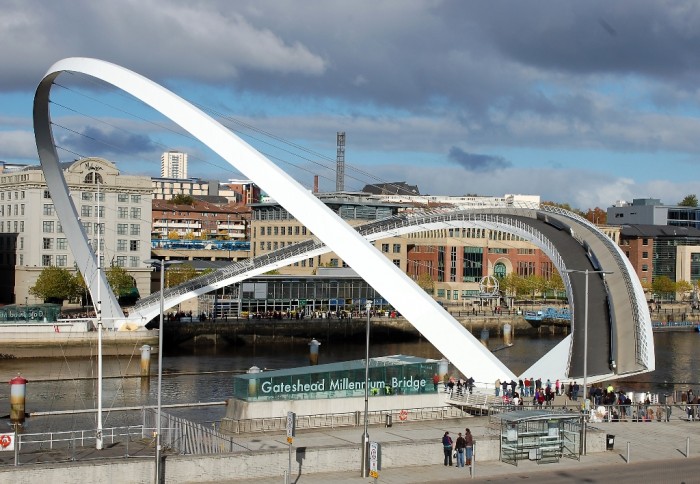 Gateshead Millennium Bridge It is constructed in Newcastle, England. It consists of two arches to be used by bikes and pedestrians and still allow the battleships to pass. 