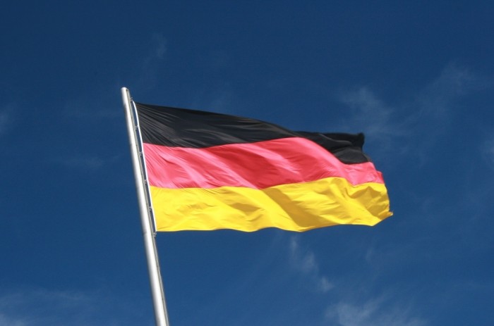 German_Flag_Flying_aganist_a_Blue_Sky