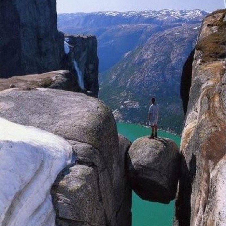 Top 10 Best Quality of Life Countries 16 Kjeragbolten-boulder-located-in-the-Kjerag-mountain-in-Rogaland-Norway.-3