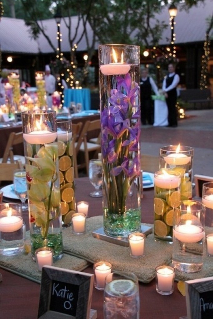 not this many colors just the idea of floating candles. 2014 beach wedding table candle decorations-f77485