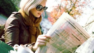 girl with newspaper Top 10 Trends in the Newspaper Industry - 19