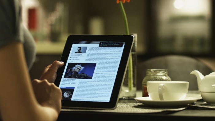 Top 10 Trends in the Newspaper Industry 8 tablet-reading