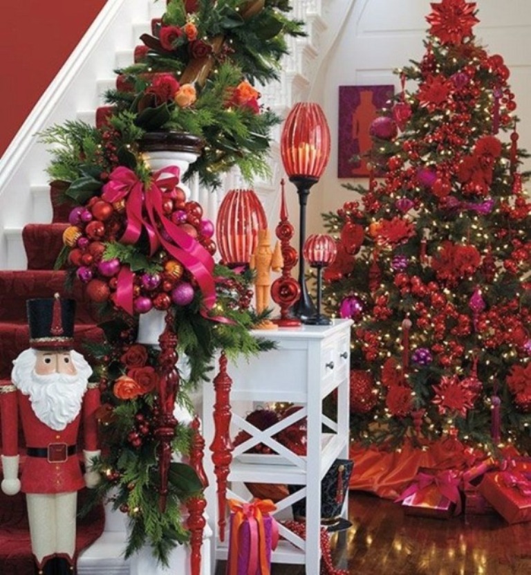 decorating-christmas-tree-red-and-gold__ 24 Latest & Hottest Christmas Trends for 2022