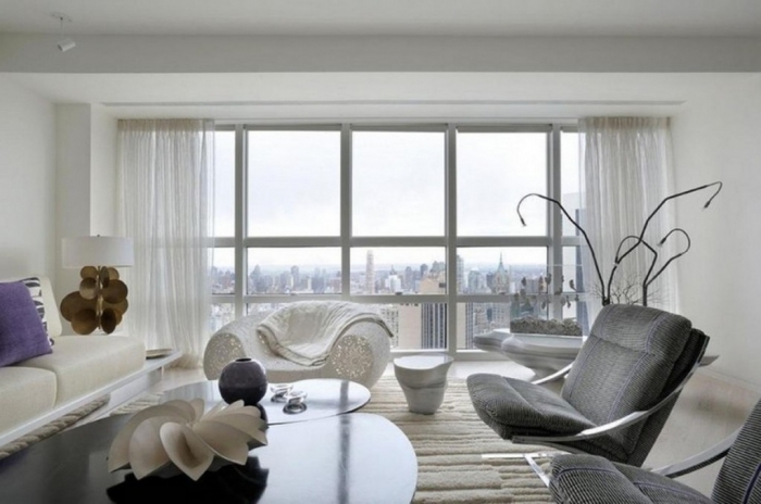 open-living-area-interior-with-grey-upholstered-lounge-chairs-and-white-sheer-curtains-also-black-glass-coffee-table-design-ideas-1024x680 Forecasting--> 25+ Hottest Trends in Home Decoration 2020
