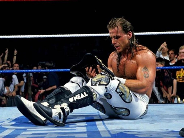 Shawn-Michaels-Holding-A-Championship-Belt Top 10 Most Famous Wrestlers in WWE