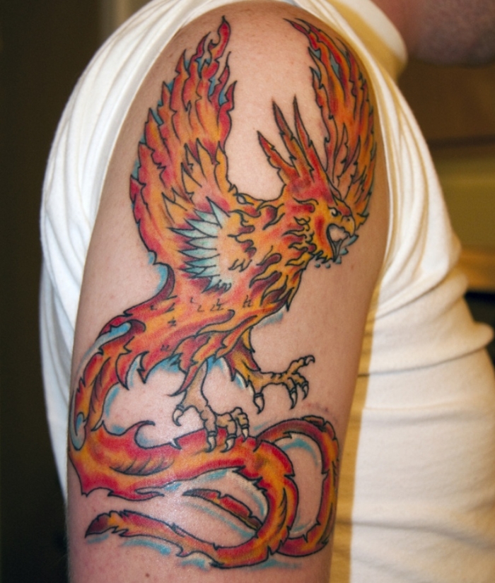 flying-phoenix-tattoo-on-upper-arm