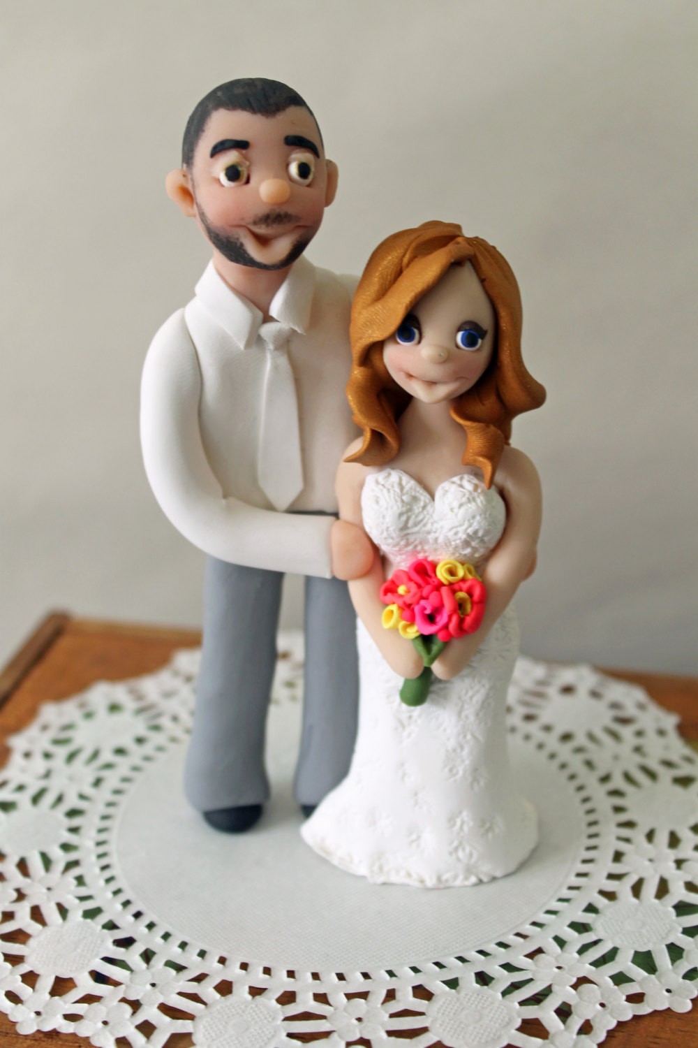 2014-couple-gift-ideas-couple-wedding-cake-toppers-polymer-clay-cake-f43559 Top 10 Most Unique and Funny Wedding Cake Toppers 2019