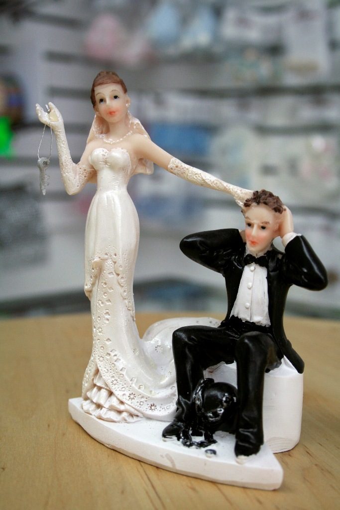 Under Ball and Chain wedding cake topper