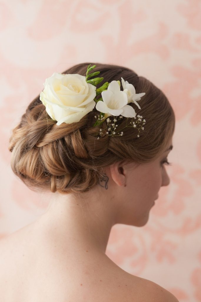 flowers-Wrapped-around-the-bun-5 50+ Most Creative Ideas to Put Flowers in Your Hair ...