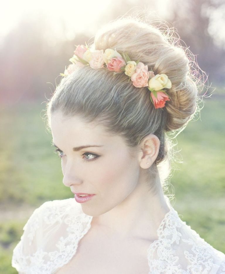 flowers-Wrapped-around-the-bun 50+ Most Creative Ideas to Put Flowers in Your Hair ...