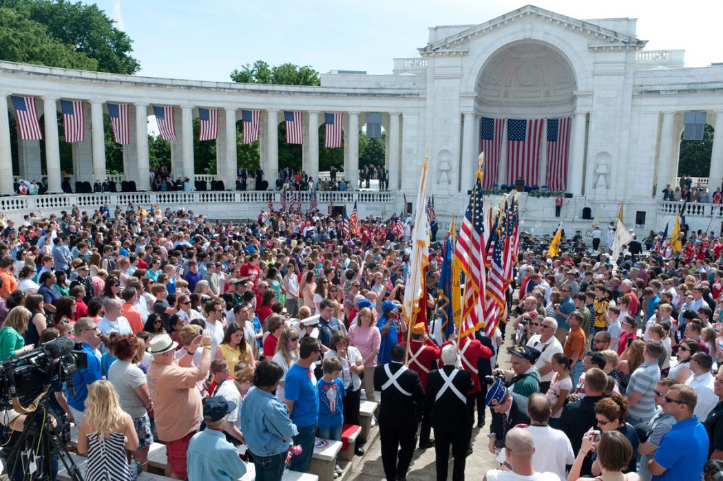 Creative Ideas: 4 Memorial Day Celebration Ideas 7 Spectators witness the Parade of Colors at the National Memorial Day Observance at Arlington National Cemetery in 2013. Each year, for both Memorial Day and Veterans Day, observances at the cemetery, veterans and military service organizations are invited to participate in a Parade of Colors. A two-person team from the organizations marches into the amphitheater, one carrying the organizational flag and the other the American flag. It is a tradition that dates back to 1948. (U.S. Army photo)