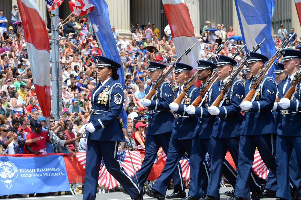 The U.S. Air Force Honor Guard marches during the National Memorial Day Parade in Washington, D.C., May 25, 2015. The National Memorial Day Parade was first launched in 2005 by the American Veterans Center in Washington, and this year Air Force Chief of Staff Gen. Mark A. Welsh III served as the grand marshal. Welsh also honored American Veterans by attending a wreath laying ceremony in Arlington National Cemetery. (U.S. Air Force photo/Scott M. Ash)